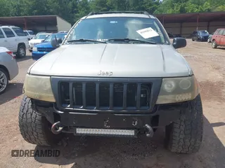 2004 Jeep Grand Cherokee Laredo with VIN 1J4GW48S34C354006, listed as a IAAI auction lot 42599812 with 258,004 mi miles and . Bid and sale history available at DreamBid. Image 6.