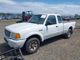 2001 Ford Ranger XL with VIN 1FTYR14V01PB01763, listed as a IAAI auction lot 42200132 with 202,457 mi miles and . Bid and sale history available at carsss.com. Image 2.