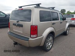 2010 Dodge Nitro Heat with VIN 1D4PT4GK7AW156722, listed as a IAAI auction lot 42508953 with 283,690 mi miles and . Bid and sale history available at DreamBid. Image 4.