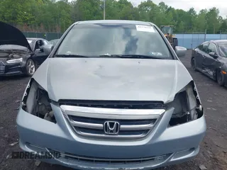 2006 Honda Odyssey EX z VIN 5FNRL38456B129594, wystawiony jako IAAI lot #42279156 z przebiegiem Nie podano mil oraz . Historia ofert i sprzedaży dostępna na DreamBid. Obrazek 6.
