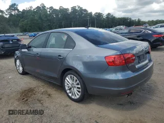 2014 Volkswagen Jetta TDI w/Premium with VIN 3VWLL7AJ4EM374570, listed as a Copart auction lot 63996195 with 186,497 mi miles and Salvage title. Bid and sale history available at DreamBid. Image 2.