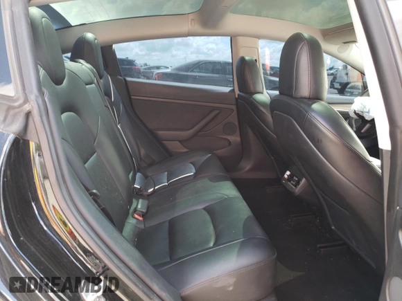 2023 Tesla Model 3 with VIN 5YJ3E1EA6PF454254, listed as a Copart auction lot 56881355 with 30,327 mi miles and Salvage title. Bid and sale history available at DreamBid. Image 10.