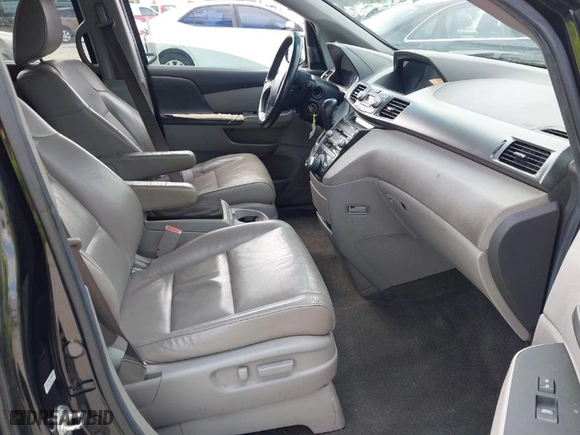2013 Honda Odyssey Touring with VIN 5FNRL5H92DB003200, listed as a IAAI auction lot 41920237 with 167,483 mi miles. Bid and sale history available at carsss.com. Image 5.
