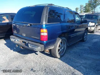 2001 Chevrolet Tahoe LS with VIN 1GNEK13T21J299814, listed as a IAAI auction lot 41821448 with 314,557 mi miles. Bid and sale history available at carsss.com. Image 4.