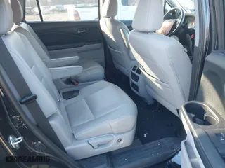 2019 Honda Pilot Touring 7-Passenger with VIN 5FNYF6H65KB061796, listed as a IAAI auction lot 41650857 with 122,417 mi miles. Bid and sale history available at carsss.com. Image 8.