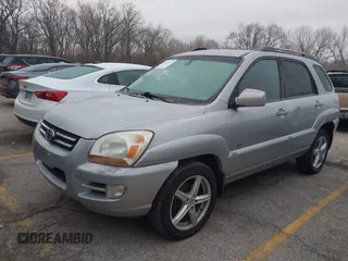 2005 Kia Sportage LX with VIN KNDJE723257071317, listed as a IAAI auction lot 41547643 with 267,610 mi miles and . Bid and sale history available at carsss.com. Image 2.