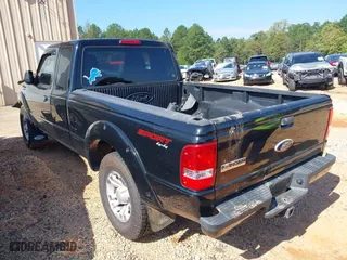 2011 Ford Ranger XLT with VIN 1FTLR4FE5BPA16802, listed as a IAAI auction lot 40502397 with 125,278 mi miles. Bid and sale history available at carsss.com. Image 3.