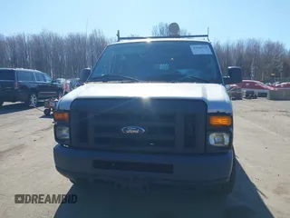 2013 Ford Econoline Cargo Commercial with VIN 1FTNE2EW4DDA30116, listed as a IAAI auction lot 42040770 with 88,468 mi miles and . Bid and sale history available at DreamBid. Image 12.