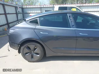 2018 Tesla Model 3 Long Range Battery with VIN 5YJ3E1EA4JF157782, listed as a IAAI auction lot 41774169 with 123,239 mi miles. Bid and sale history available at carsss.com. Image 22.
