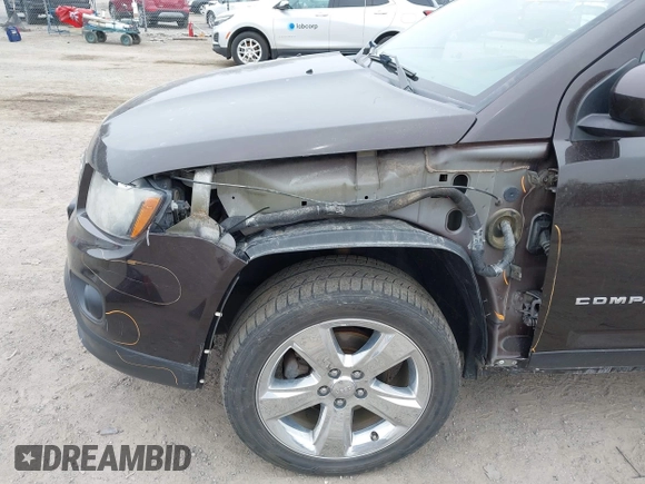 2014 Jeep Compass Latitude with VIN 1C4NJDEB5ED731057, listed as a IAAI auction lot 41938769 with 175,289 mi miles and . Bid and sale history available at carsss.com. Image 6.