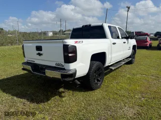 2014 Chevrolet Silverado 1500 LT with VIN 3GCUKREC2EG103443, listed as a Copart auction lot 51809885 with 188,638 mi miles and Clean Title. Bid and sale history available at carsss.com. Image 4.