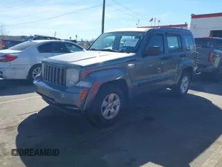 2012 Jeep Liberty Sport with VIN 1C4PJMAK1CW161414, listed as a IAAI auction lot 41871365 with 204,924 mi miles. Bid and sale history available at carsss.com. Image 2.