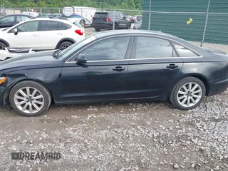 2014 Audi A6 Premium Plus z VIN WAUGFAFCXEN065126, wystawiony jako IAAI lot #42333403 z przebiegiem 121 467 mil mil oraz . Historia ofert i sprzedaży dostępna na DreamBid. Obrazek 14.