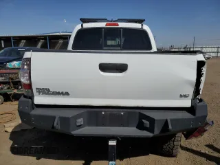 2014 Toyota Tacoma with VIN 3TMLU4EN7EM144839, listed as a Copart auction lot 52728065 with 32,610 mi miles and Salvage Title. Bid and sale history available at DreamBid. Image 6.
