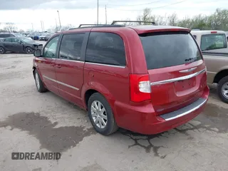 2013 Chrysler Town & Country Touring with VIN 2C4RC1BG4DR604063, listed as a IAAI auction lot 42029869 with 173,309 mi miles. Bid and sale history available at carsss.com. Image 3.