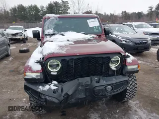 2021 Jeep Gladiator Willys with VIN 1C6HJTAG6ML571081, listed as a IAAI auction lot 41368902 with 45,077 mi miles and . Bid and sale history available at DreamBid. Image 12.