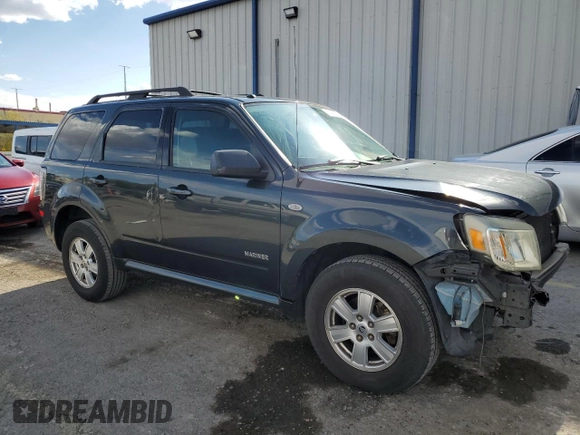 2008 Mercury Mariner z VIN 4M2CU81178KJ37731, wystawiony jako Copart lot #55255335 z przebiegiem 195 054 mil mil oraz Szkoda całkowita • Salvage title. Historia ofert i sprzedaży dostępna na DreamBid. Obrazek 4.