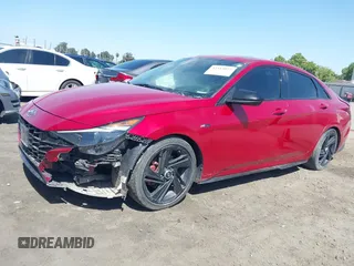 2021 Hyundai Elantra N Line z VIN KMHLR4AF7MU147407, wystawiony jako IAAI lot #42313077 z przebiegiem 124 298 mil mil oraz . Historia ofert i sprzedaży dostępna na DreamBid. Obrazek 14.