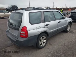 2003 Subaru Forester X with VIN JF1SG63633G728520, listed as a IAAI auction lot 41808658 with 104,084 mi miles. Bid and sale history available at carsss.com. Image 4.