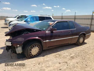 1996 Cadillac Eldorado z VIN 1G6EL12Y7TU610127, wystawiony jako Copart lot #62440504 z przebiegiem Nie podano mil oraz Czysty tytuł • Clean title. Historia ofert i sprzedaży dostępna na DreamBid. Obrazek 1.