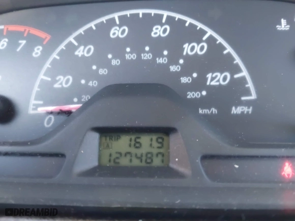 2005 Mitsubishi Lancer ES with VIN JA3AJ26E65U014838, listed as a IAAI auction lot 41310586 with 127,487 mi miles. Bid and sale history available at carsss.com. Image 7.