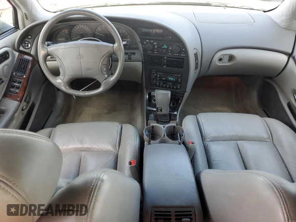 1997 Oldsmobile Aurora with VIN 1G3GR62C0V4102252, listed as a Copart auction lot 53270245 with 123,615 mi miles and Salvage Title. Bid and sale history available at DreamBid. Image 8.