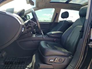 2010 Audi Q7 with VIN WA1DVBFE4AD002548, listed as a Copart auction lot 58854975 with 151,437 mi miles and Salvage title. Bid and sale history available at DreamBid. Image 7.