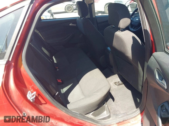 2018 Ford Focus SE z VIN 1FADP3F26JL321831, wystawiony jako IAAI lot #42085951 z przebiegiem 87 729 mil mil oraz . Historia ofert i sprzedaży dostępna na DreamBid. Obrazek 8.