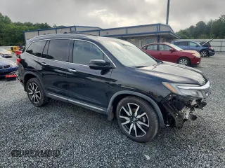 2019 Honda Pilot Elite with VIN 5FNYF6H05KB071031, listed as a Copart auction lot 60777585 with 96,155 mi miles and Salvage title. Bid and sale history available at DreamBid. Image 4.