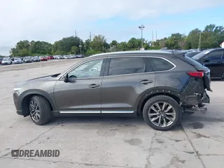 2017 Mazda CX-9 Grand Touring with VIN JM3TCADY7H0133092, listed as a IAAI auction lot 41133652 with 233,454 mi miles and . Bid and sale history available at DreamBid. Image 15.
