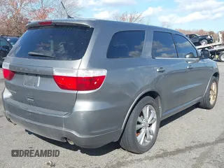 2011 Dodge Durango Heat with VIN 1D4RE3GG8BC733088, listed as a IAAI auction lot 40764161 with 149,846 mi miles. Bid and sale history available at carsss.com. Image 4.