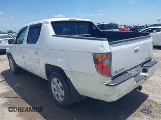 2007 Honda Ridgeline RTL z VIN 2HJYK16537H527957, wystawiony jako IAAI lot #42098143 z przebiegiem 233 163 mil mil oraz . Historia ofert i sprzedaży dostępna na DreamBid. Obrazek 3.