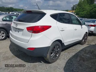 2015 Hyundai Tucson GLS with VIN KM8JT3AF6FU982128, listed as a IAAI auction lot 42227235 with 141,612 mi miles and . Bid and sale history available at DreamBid. Image 4.