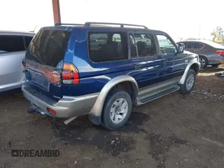 2001 Mitsubishi Montero Sport LS with VIN JA4MT31H71P007335, listed as a IAAI auction lot 41465825 with 258,707 mi miles. Bid and sale history available at carsss.com. Image 4.
