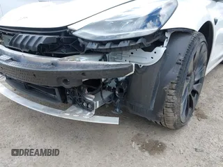 2021 Tesla Model 3 Performance with VIN 5YJ3E1EC2MF096681, listed as a IAAI auction lot 42068782 with 34,852 mi miles and . Bid and sale history available at DreamBid. Image 6.
