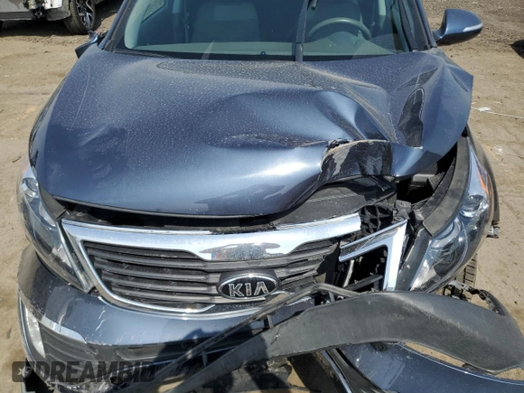 2013 Kia Sportage EX z VIN KNDPCCA20D7428834, wystawiony jako Copart lot #53731845 z przebiegiem 41 162 mil mil oraz Szkoda całkowita • Salvage title. Historia ofert i sprzedaży dostępna na DreamBid. Obrazek 12.