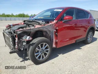 2023 Mazda CX-5 2.5 S Preferred Package with VIN JM3KFBCMXP0184897, listed as a Copart auction lot 50264135 with 28,556 mi miles and Salvage Title. Bid and sale history available at carsss.com. Image 1.