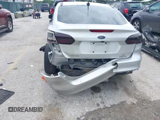 2016 Ford Focus SE z VIN 1FADP3F22GL373756, wystawiony jako IAAI lot #42369795 z przebiegiem 99 646 mil mil oraz . Historia ofert i sprzedaży dostępna na DreamBid. Obrazek 13.
