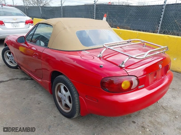 1999 Mazda MX-5 Miata with VIN JM1NB3532X0113205, listed as a IAAI auction lot 41981635 with 111,544 mi miles. Bid and sale history available at carsss.com. Image 3.