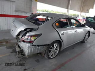 2014 Nissan Maxima SV z VIN 1N4AA5AP6EC463959, wystawiony jako IAAI lot #40179497 z przebiegiem 182 867 mil mil oraz . Historia ofert i sprzedaży dostępna na DreamBid. Obrazek 4.