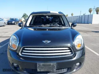 2013 MINI Cooper Countryman with VIN WMWZB3C52DWM07621, listed as a IAAI auction lot 42085389 with 153,714 mi miles. Bid and sale history available at carsss.com. Image 12.