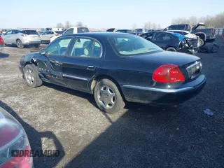 2001 Lincoln Continental with VIN 1LNHM97V41Y716010, listed as a IAAI auction lot 41470767 with 163,092 mi miles and . Bid and sale history available at DreamBid. Image 3.