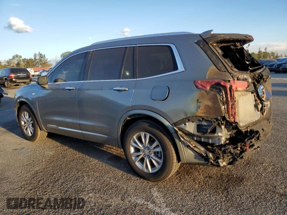 2024 Cadillac XT6 FWD Luxury with VIN 1GYKPAR40RZ744121, listed as a Copart auction lot 86413604 with 7,527 mi miles and Salvage Title. Bid and sale history available at carsss.com. Image 2.