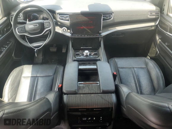 2022 Jeep Wagoneer Series III with VIN 1C4SJVDT9NS212446, listed as a Copart auction lot 55009165 with 61,788 mi miles and Salvage Title. Bid and sale history available at DreamBid. Image 8.