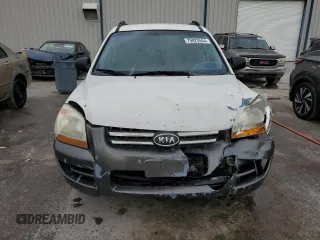 2005 Kia Sportage LX with VIN KNDJF723557078730, listed as a Copart auction lot 79823504 with 166,509 mi miles and Salvage Title. Bid and sale history available at carsss.com. Image 5.