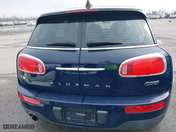2016 MINI Cooper Clubman with VIN WMWLN5C54G2E30843, listed as a IAAI auction lot 41371368 with 1 mi miles. Bid and sale history available at carsss.com. Image 8.
