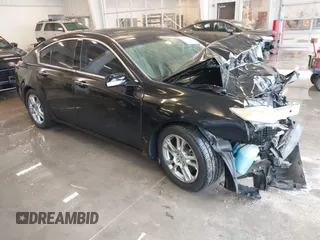 2009 Acura TL Tech with VIN 19UUA86549A010863, listed as a IAAI auction lot 41001252 with 186,441 mi miles. Bid and sale history available at carsss.com. Image 1.