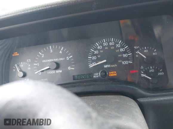1998 Jeep Cherokee Sport with VIN 1J4FT68S6WL272337, listed as a IAAI auction lot 42147195 with 302,764 mi miles. Bid and sale history available at carsss.com. Image 7.