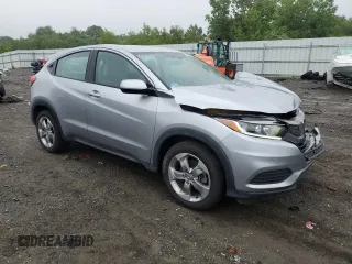 2021 Honda HR-V LX with VIN 3CZRU6H32MM701102, listed as a Copart auction lot 63215115 with 82,333 mi miles and Salvage title. Bid and sale history available at DreamBid. Image 4.