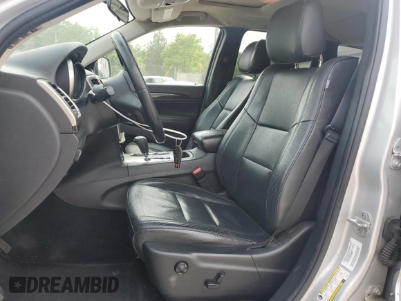 2011 Jeep Grand Cherokee Laredo with VIN 1J4RR4GG3BC581321, listed as a Copart auction lot 60893935 with 216,137 mi miles and Clean title. Bid and sale history available at DreamBid. Image 7.